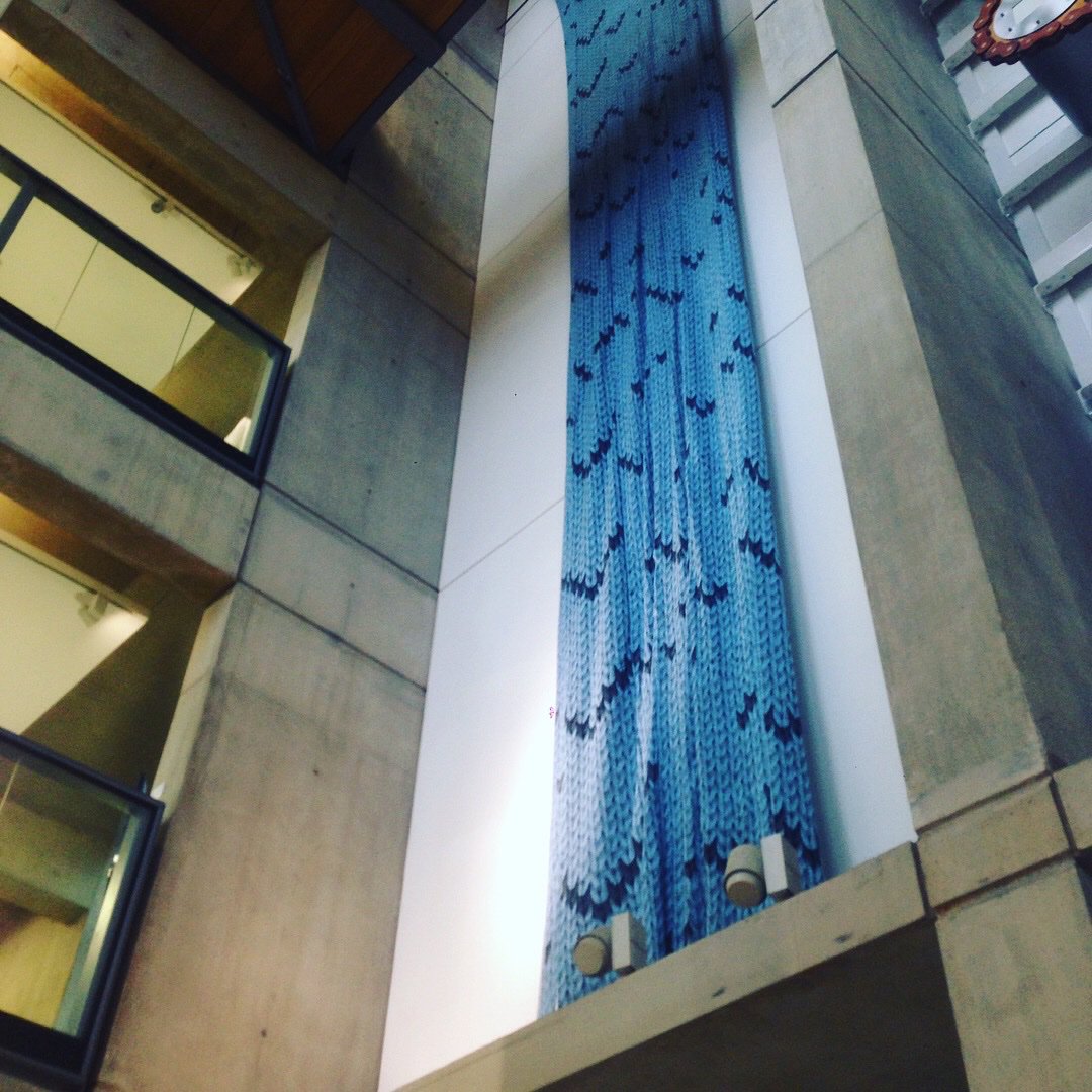 videosmithery's tweet image. a 16 metre meta knit of giant  stitches to create a knitted waterfall. Proud to have it displayed in @McrSchArt as part of the #RadicalResponse exhibit for @IASDR2019