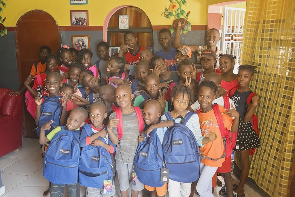 ChanjeMovement's tweet photo. For those who donated school supplies, THANK YOU! The supplies were delivered to the children and they were so excited to receive new backpacks for the upcoming school year!  Please keep these children in your prayers as they take on a new year of school. #chanjemovement #haiti https://t.co/7CHDekFCsb