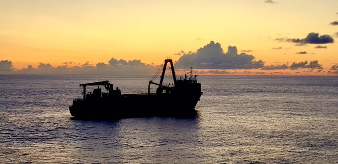 An apparently abandoned Merchant Vessel lies deserted in the Atlantic.