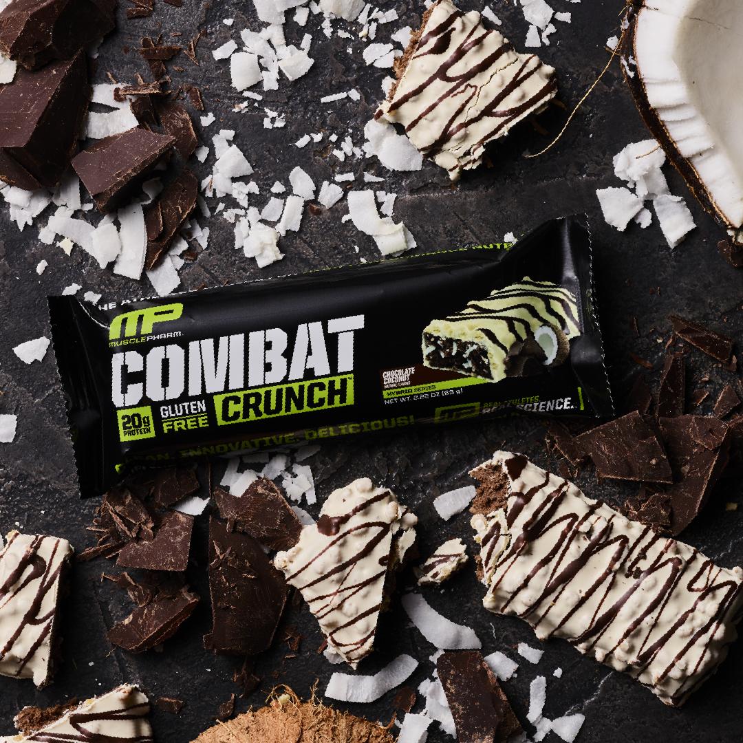 MusclePharm's tweet photo. It's World Coconut Day! What better way to celebrate than with our Chocolate Coconut Combat Crunch Bar. Packing 20g of Protein, no better post workout snack than this! #welivethis #mpnation #musclepharm #proteinbar #worldcoconutday #coconut #chocolate #chocolatecoconut https://t.co/IV86WC11NP
