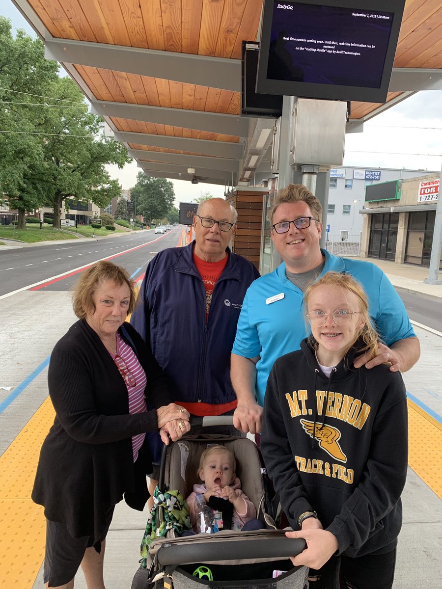 KirOnTransport's tweet photo. After years of hard work, @IndyGoBus launched the #RedLine this wknd. We rode to visit Ryan, who woke up at 5a to help folks on 38th &amp; Meridian. The ride was great, but even better was the energy among the crowds out supporting public transit. #Indy was certainly #ReadyForRed. https://t.co/w4b2zw1AY7