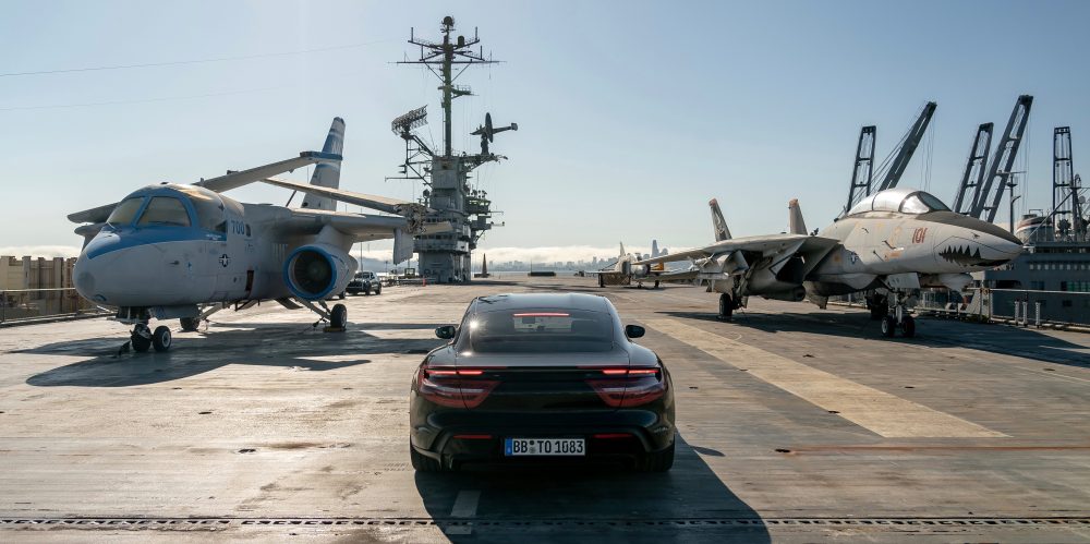 ElectrekCo's tweet photo. Porsche Taycan does 0-90 mph acceleration in 10 secs on an aircraft carrier https://t.co/zpkfQeOslx by @fredlambert https://t.co/0s0BMAVdxI