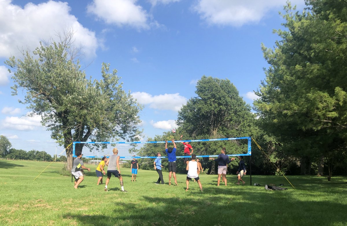 Enjoying Labor Day with our Welcome back BBQ while playing some grass volleyball! 🐝🏐