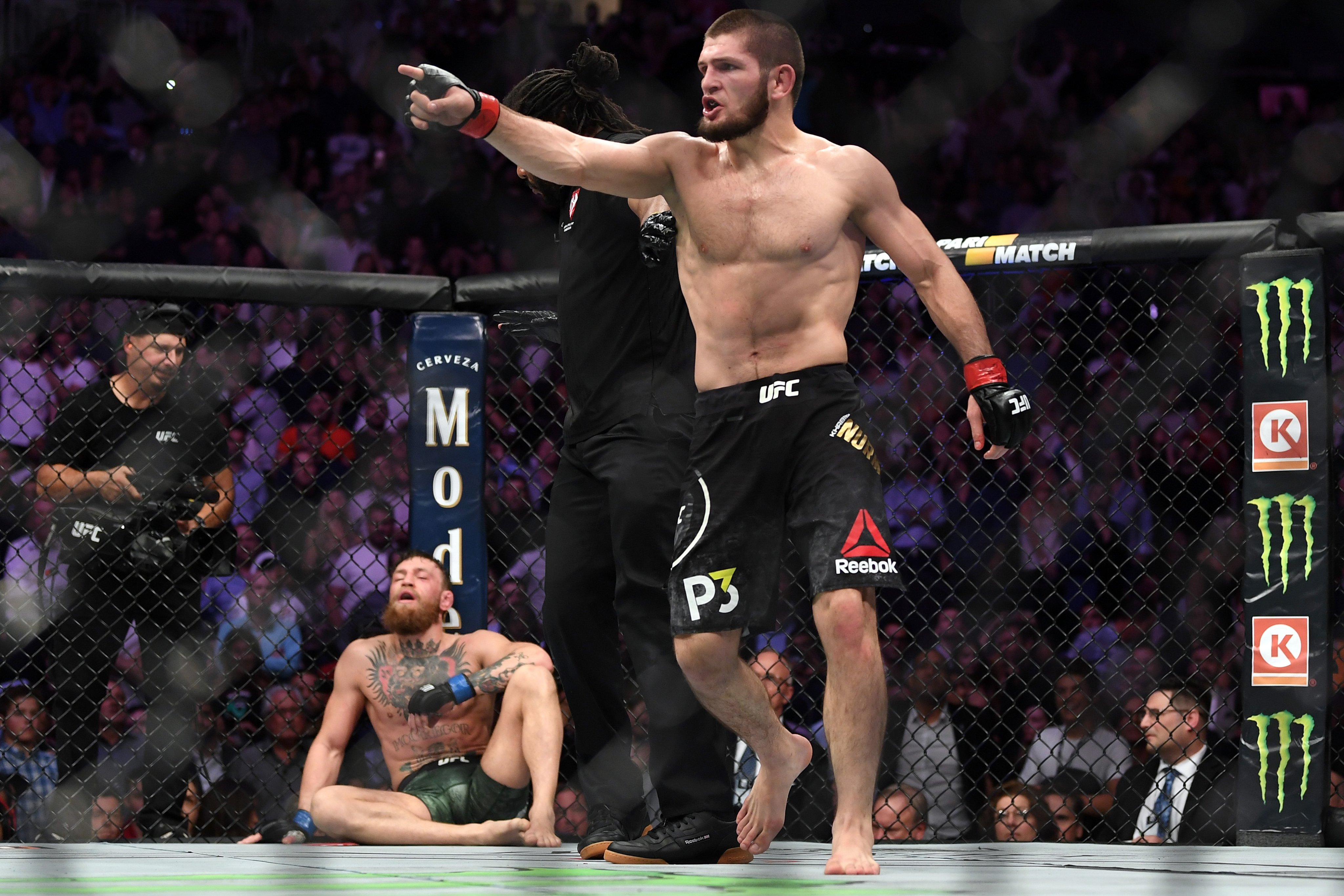 Khabib Nurmagomedov exchanges words with Conor McGregor's team, following victory at UFC 229 (UFC/Getty Images)