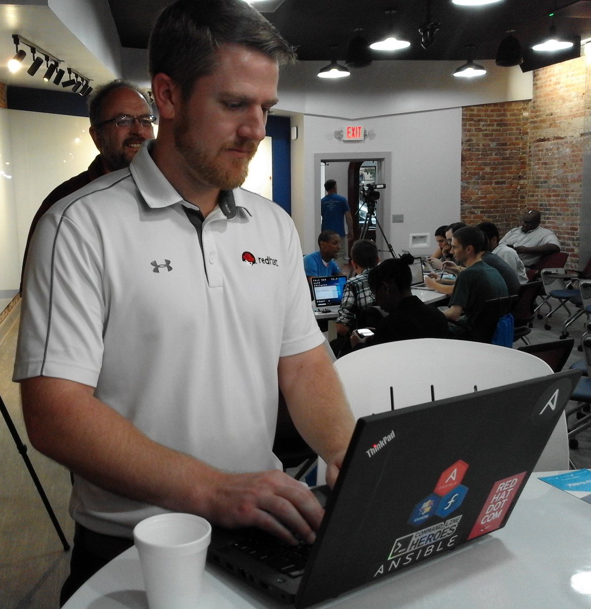 I85Cyber's tweet photo. Developer talent from @I85Cyber fully engaged during the inaugural @mgmwerx #CodingSprint.  Big shout-outs to @RedHat/@RedHatGov for sponsorship, #DevSecOps provisions and a #DevSecOps engineer for the Sprint's duration!!  Scrum Master Bryant Noel kept the team focused/on track. https://t.co/2JuR4u3Y4O