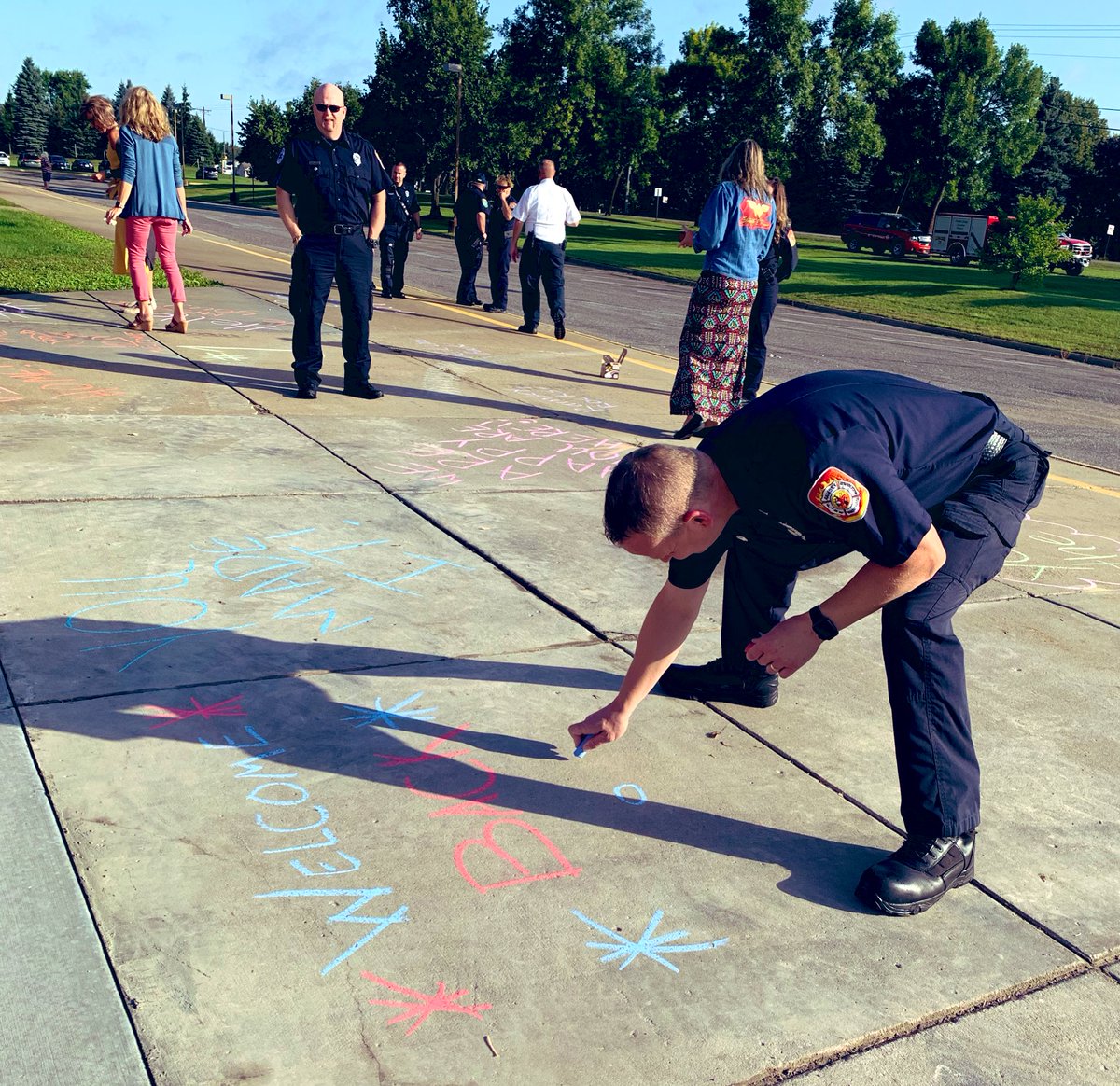 ramseyeagle's tweet photo. First day of school! A big shout out to our Ramsey Fire and Police Departments for volunteering. We can’t wait for our Ramsey Eagles to arrive! #welcomeback #RamseyEaglePride https://t.co/BvwIoqicj6