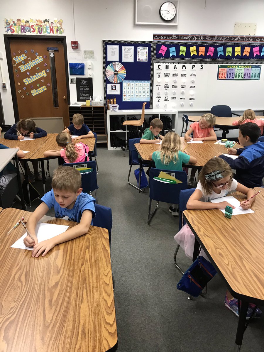 Students engaged in their narrative writing assessment. #EngageD64