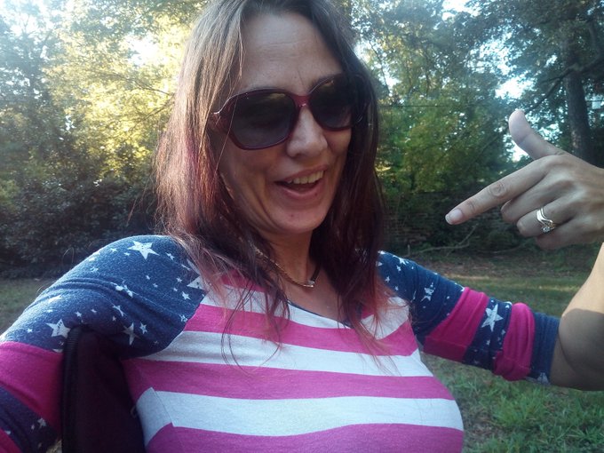 a few weeks ago Tiffany says as she pulls her hair into a pony tail and snips the end the Farrah faucet