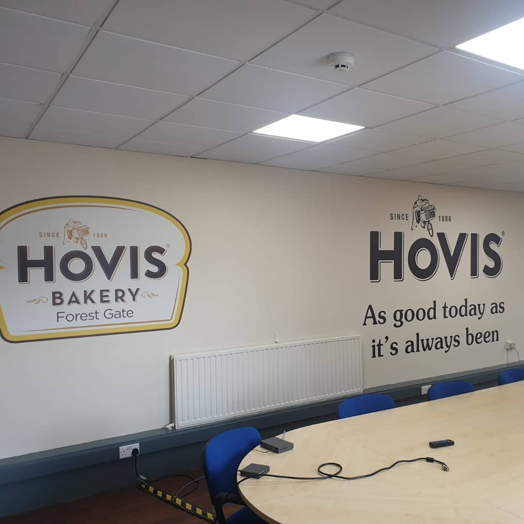The last few weeks have been crazy busy for the team at Glasshouse! We have been back to Hovis Forest Gate to add their prestigious branding. Using large wall vinyls, Hovis now have their famous logo on display for all visitors to see! #logo #brand #officeinterior #printers
