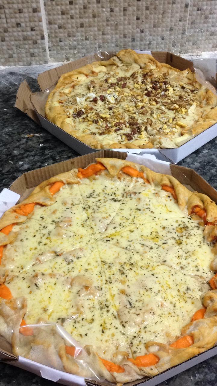 Pizza de calabresa com frango catupiry e borda de cheddar. - Picture of  Pizzaria Fratello, Bertioga - Tripadvisor