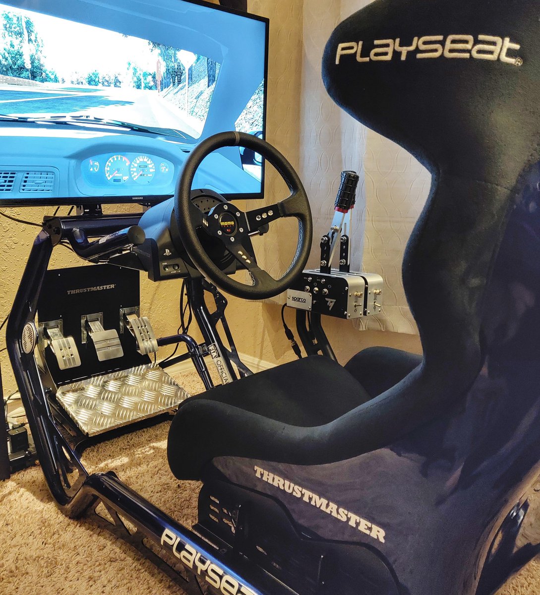 JTLauro's tweet photo. Who wants to do some drifting? Setup ➡️ @TMThrustmaster T-GT with the @DimSimRace wheel adapter, 2x TSS Handbrake Sparco Mod, and T3PA Pro Pedal Set. All mounted on a @PlayseatGlobal Sensation Pro FIA Edition #Thrustmaster #simracing #drifting #drift #racing #AssettoCorsa https://t.co/dauhDyHwpO