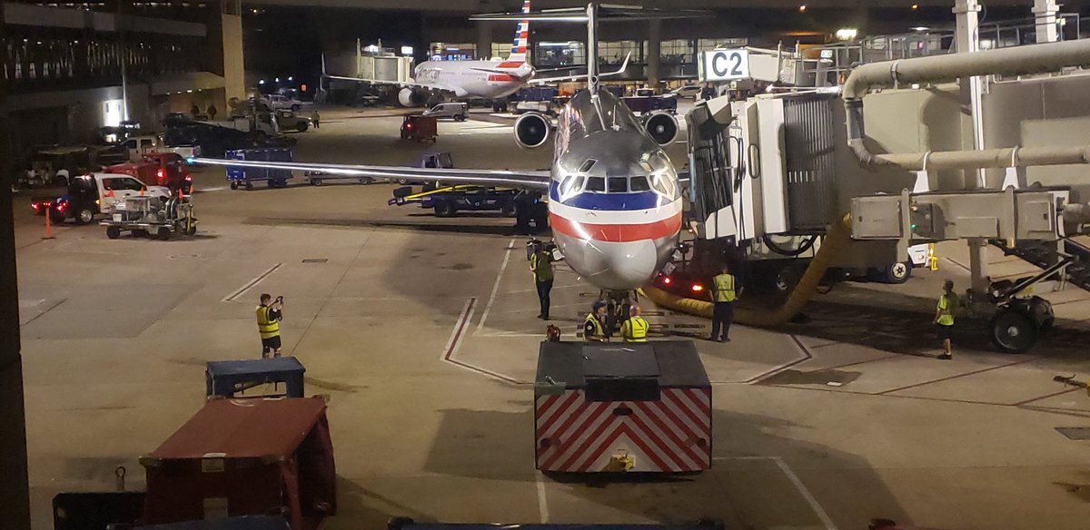rabbitturd's tweet photo. DFW ground crew posing with a recent arrival on the eve #Super80SendOff https://t.co/OZI5bSZlLs