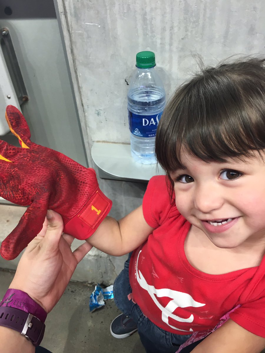 sdonelson12's tweet photo. Had the chance to sit down by the dugout at last Friday’s game and Bella cheered her head off for the @Braves. And @ozzie seen her and wanted her to have his batting gloves so he sent them over. Thanks Ozzie we were already a fan but now you have 2 forever fans right here. ❤️ https://t.co/V2hENOUkvj