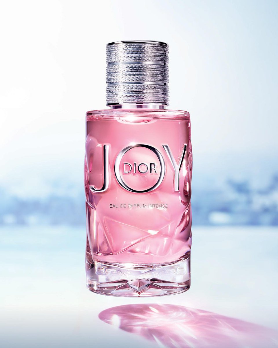 JOY by Dior, the new Eau de Parfum Intense. The dazzle of juicy citrus mingles with intensely colorful sparks of Grasse Rose and Jasmine heightened by a sensually delicious echo of sandalwood and vanilla. # joybydior