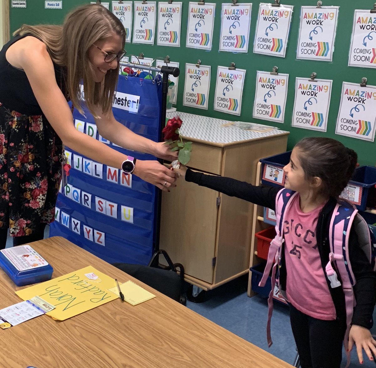 SpencerportCSD's tweet photo. #Bernabi kindergartner with a flower for her new teacher, Mrs. Bender. #RangerPride #WelcomeBack2019 https://t.co/c7TLiF8xtK