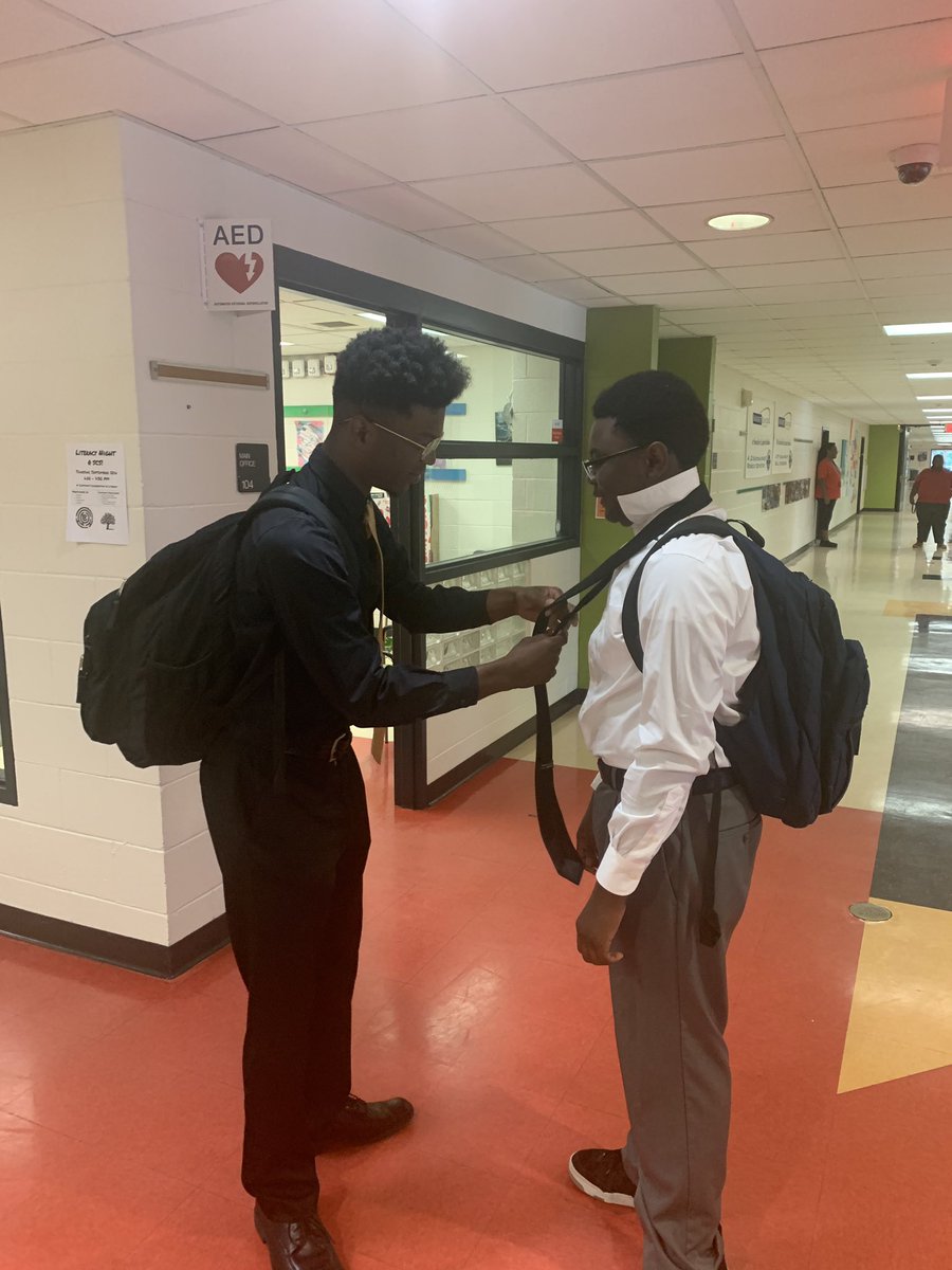 christytechhall's tweet photo. Older brother Jason McMiller who is a member of YMA ensuring that younger brother Jalen is set and ready for their afternoon Jr. YMA meeting!#showingsupport #scs @SCSMsPrice @pmubenga https://t.co/NbUZDBfa36