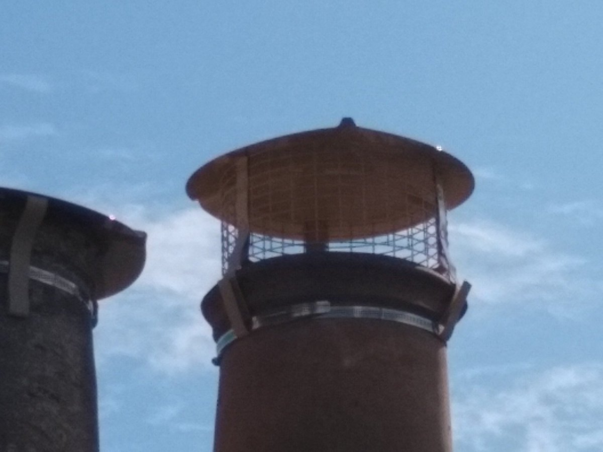 HotFlue's tweet photo. Atop the stack, we also deal with pots, cowls, bird guards and repairs. Michael &amp; Rob have a head for heights, love a risk assessment and have all the PPE and insurance necessary to safely and legally perform these jobs. For caps and cowls we use #brewercowls. https://t.co/FouR5rqen4