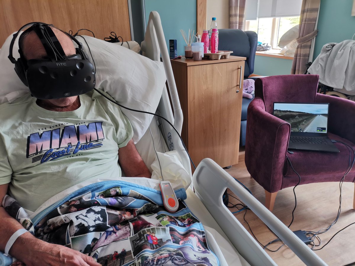 John, a patient receiving palliative care @StColumbas LOVES motorcycles. Today it was our pleasure to let John motorbike along the NC500, across the Golden Gate bridge, and throughout the highlands of Scotland, all without leaving his bed. #vrforgood #VirtualReality #hospice