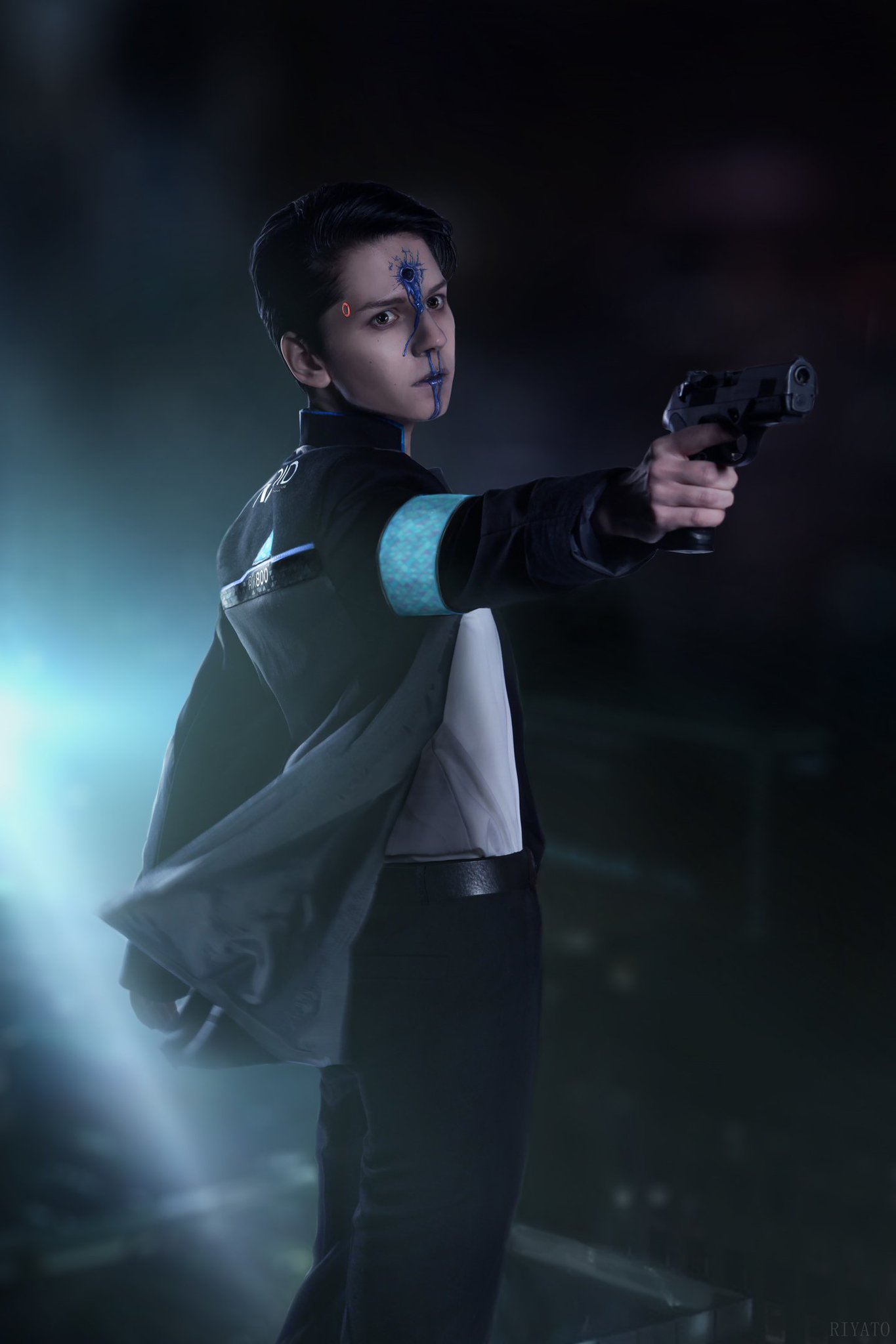 Download Detroit Become Human Connor Holding Gun Wallpaper