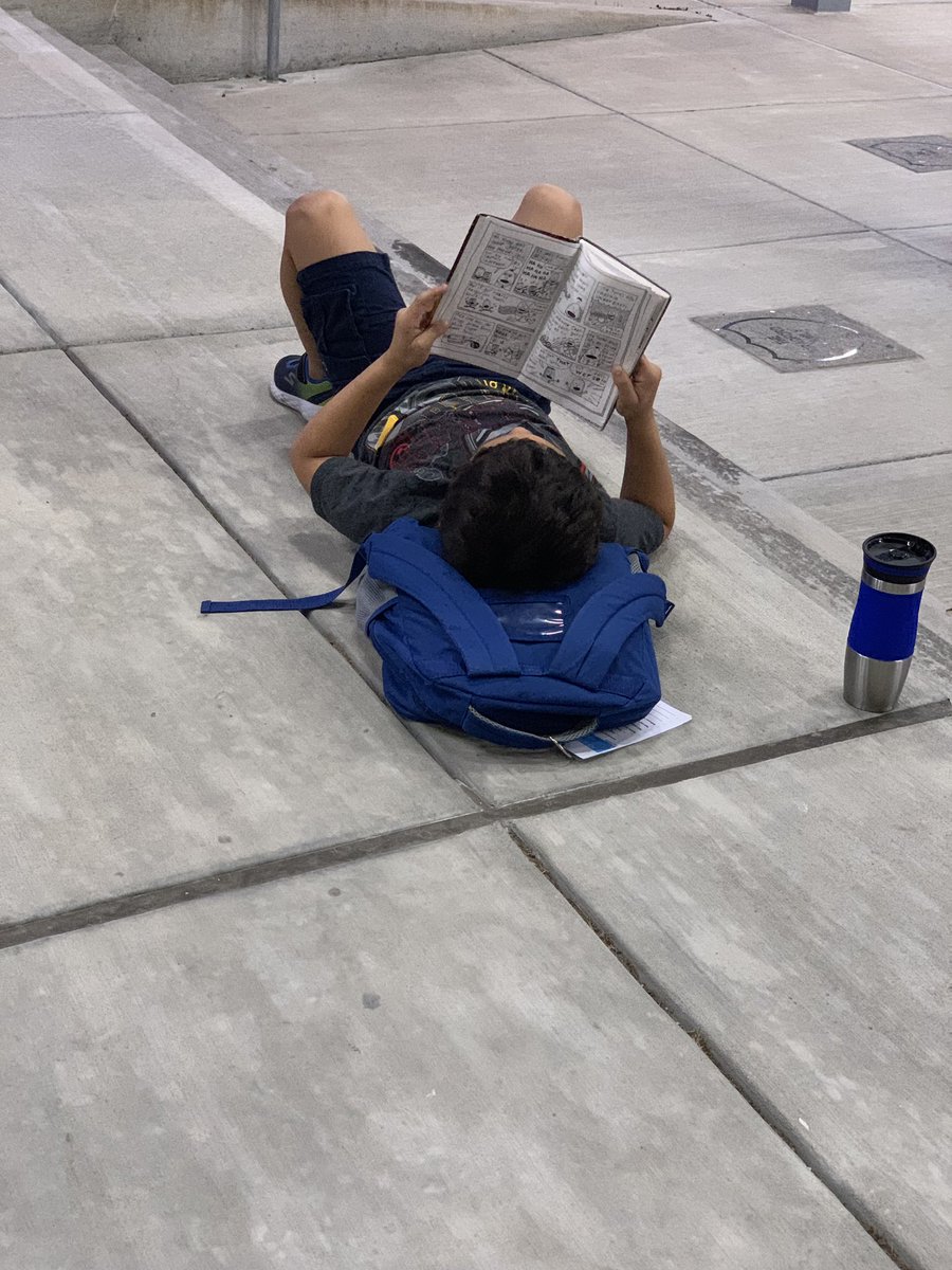 LibVoe's tweet image. This kiddo found the perfect spot to wait for the doors to open this morning. #voelibrary #sbisd