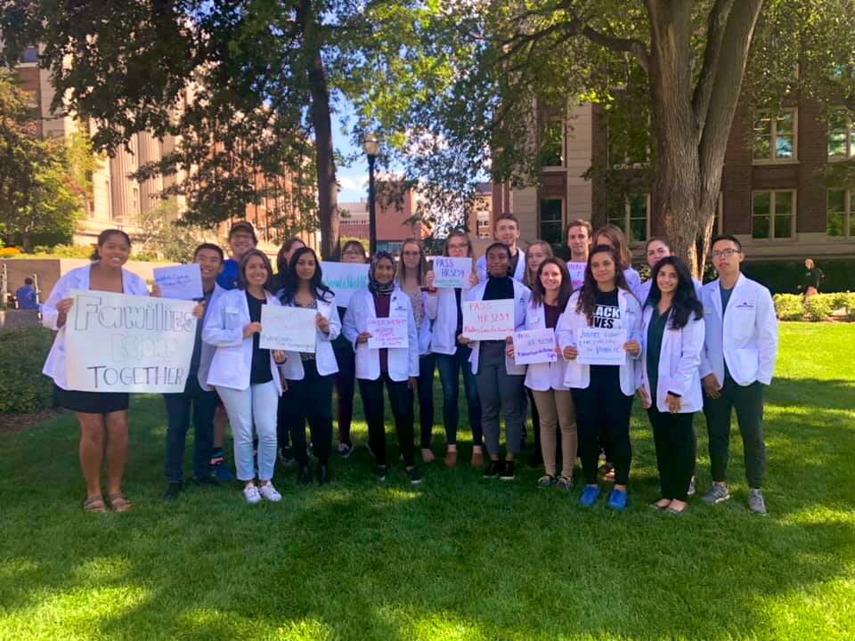 My lovely classmates and I rallying for human rights at the border (the least we can ask, really). #WhiteCoatsforHumanRights 

Senators, we’re counting on you to pass H.R. 3239. 
<a href="/amyklobuchar/">Amy Klobuchar</a> <a href="/TinaSmithMN/">Tina Smith</a> <a href="/ewarren/">Elizabeth Warren</a> <a href="/EdMarkey/">Ed Markey</a>