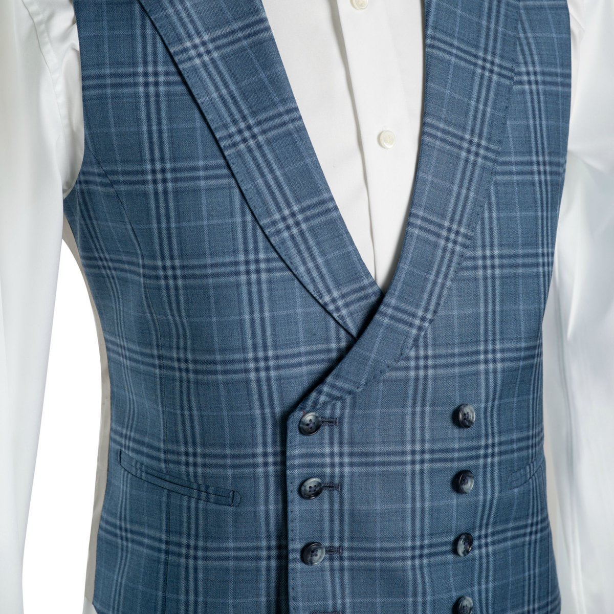 If you've not worn a waistcoat before what's stopping you? They look great and give your silhouette a sleek appearance too. This fab shawl collared, eight button, double breasted, checked waistcoat will look stunning under a navy blue suit or worn with smart trousers. #Suits
