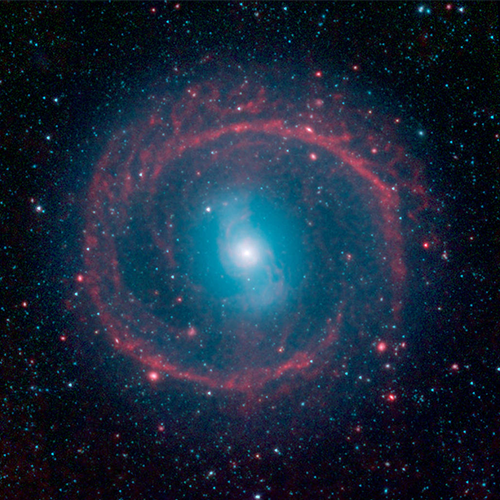An oval-shaped, fuzzy blue glow with a bright white center is surrounded by a ring of red
