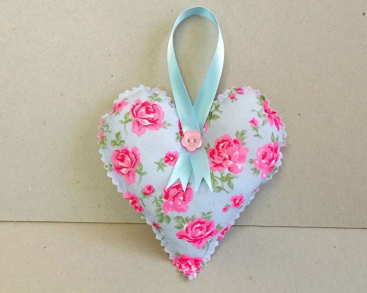 kernowclaire1's tweet photo. Pretty fabric hanging heart in blue with pink flowers. #fabricheart #handmade #newonfolksy #giftforher #cottagechic #madeincornwall https://t.co/1Nio7z1MAa https://t.co/LeJtNITCTy