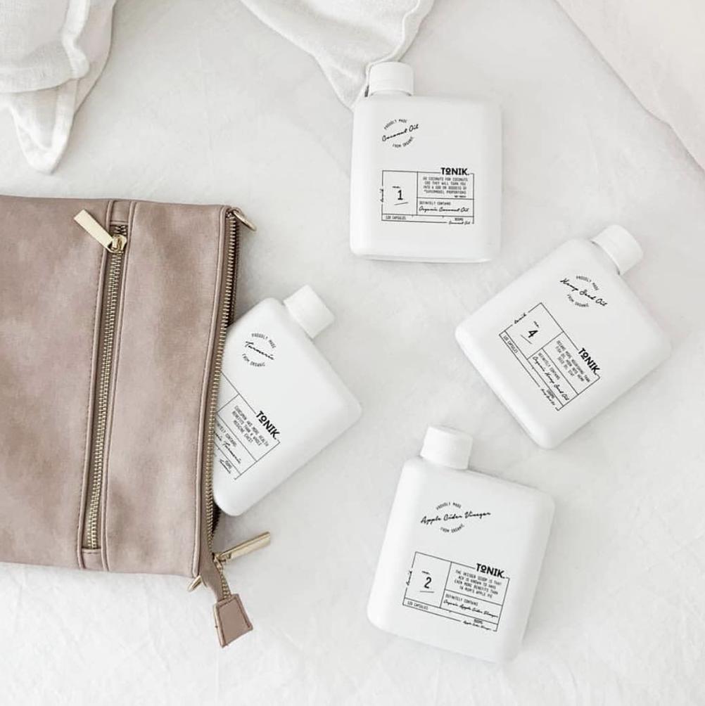 TheTonikHQ's tweet photo. Getting your hands on one of our bundles will make you feel good, but popp’n one (or two) of those caps will make you feel good’r. https://t.co/sGEBL9EO6u