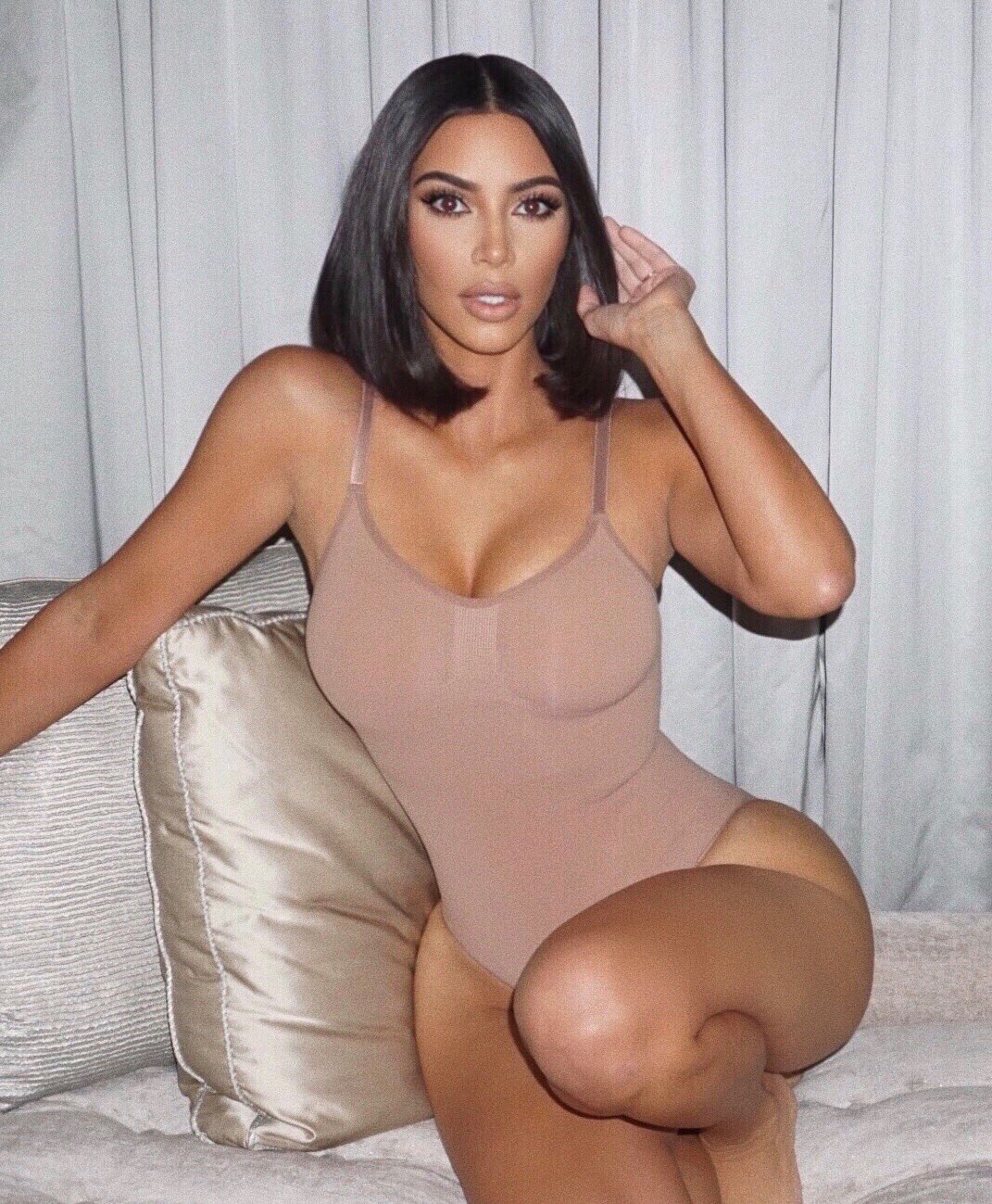 Kim Kardashian on X: I'm wearing the @skims Sculpting Bodysuit in shade  Sienna. It gives full body support with built in compression to smooth your  torso and sculpt your waist. Launching Sept