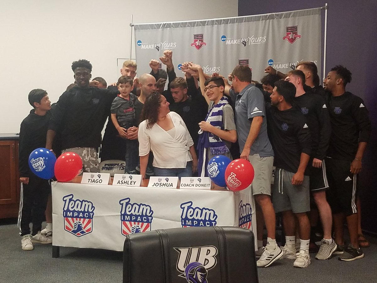 izzi_lou's tweet photo. Great moment as UB men's soccer coach Pete Doneit signs Joshua to a team contract through Team Impact. @UBPurpleKnights @UBridgeport @UBMens_Soccer @UBWSoccer https://t.co/H1pgonGSOO