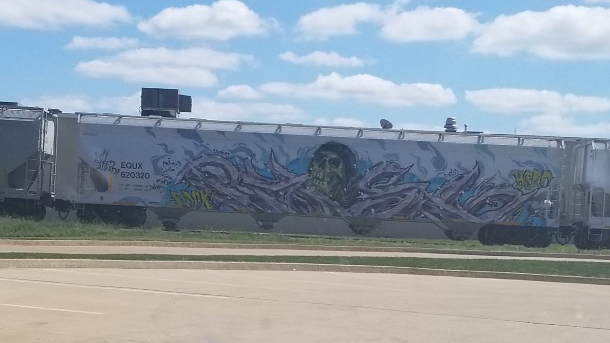 ErikVarness's tweet photo. A couple things: 

1. When you see a train, you say TRAIN! Out loud. Even if you're by yourself. Same with cows.
2. If you see a train with graffiti this awesome, you say SWEET!  Same with cows. https://t.co/SGDVS2dn86