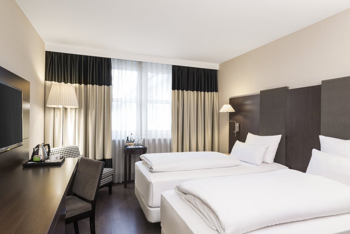 NHHotels's tweet photo. Get ready to snuggle up in bed for hours on end! Our #HotelOfTheWeek NH Frankfurt Airport's suites will transport you to a place of total quiet and comfort #alwaysconvenient https://t.co/1LaHvyt9yv https://t.co/ZoNypcFihC