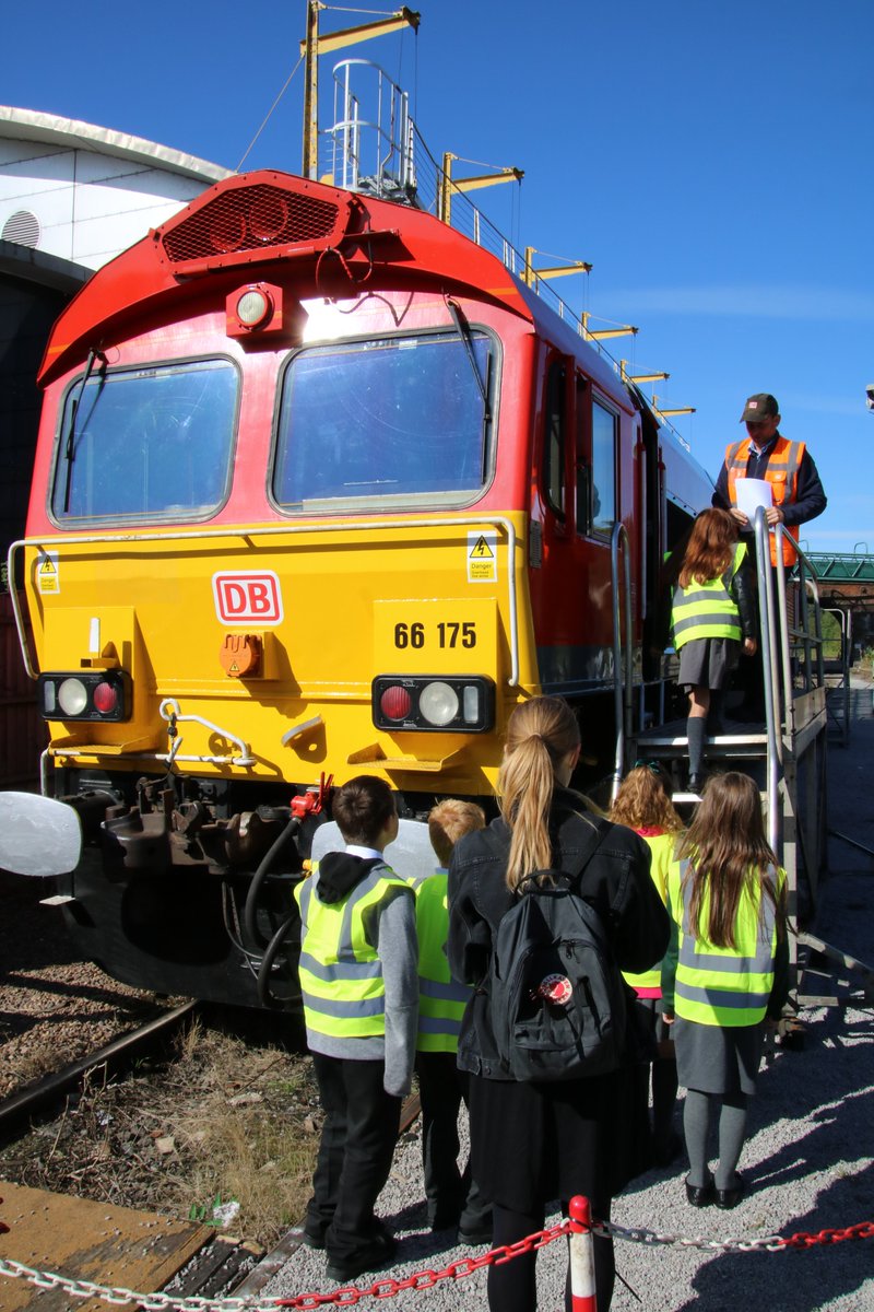 DBCargoUK's tweet photo. Rail safety was the focus of a visit by Year 6 students from Smawthorne Henry Moore Primary School in Castleford to our depot in Knottingley today. The children were treated to a cab ride and a tour of our engineering workshops. https://t.co/CML38kfY2x