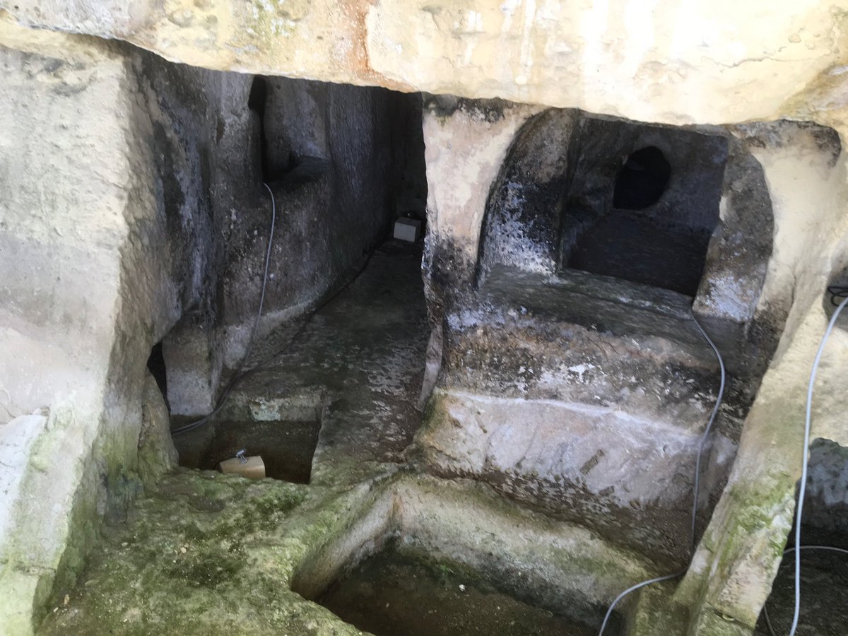 Sarah404BC's tweet photo. Funerary #cubiculum at Ta Bistra reused as storage areas, animal pens & air raid shelters. Basin carved into table in second triclinium....animals need troughs! https://t.co/qDvEoG98St