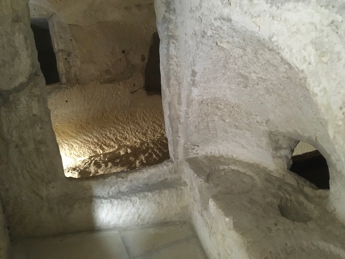 Sarah404BC's tweet photo. Funerary #cubiculum at Ta Bistra reused as storage areas, animal pens & air raid shelters. Basin carved into table in second triclinium....animals need troughs! https://t.co/qDvEoG98St