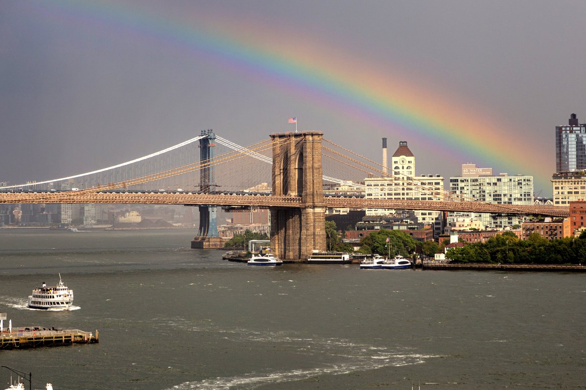 NYC_DOT's tweet image. In Manhattan, #onStatenIsland and beyond, did you see the 🌈 yesterday? We captured the rainbow as it arched across the sky over the #BrooklynBridge and the #StatenIslandFerry.
