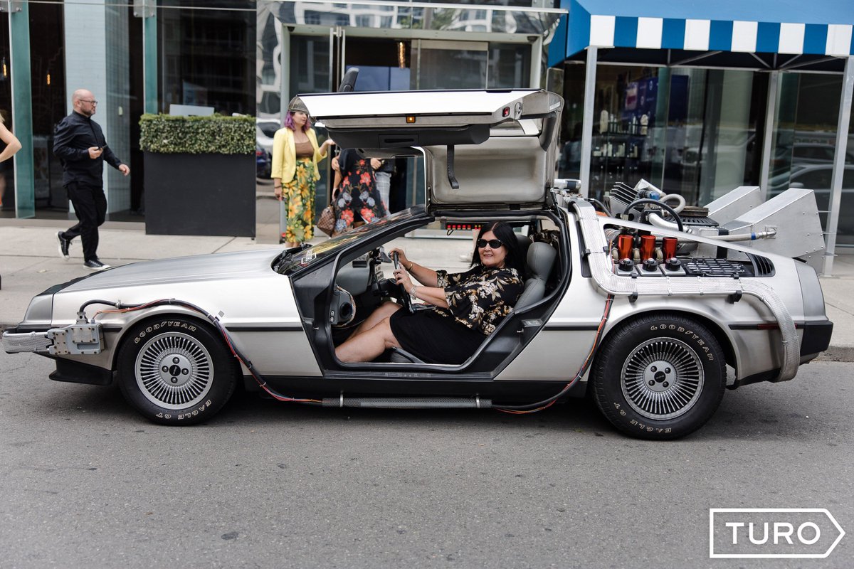 Torontonicity's tweet image. That&apos;s me behind the wheel of a DeLorean in front of @ThompsonToronto during #BaskItStyle2019 . You can book a DeLorean and other gorgeous cars @Turo ! #TIFF2019 #TIFF19 #Toronto