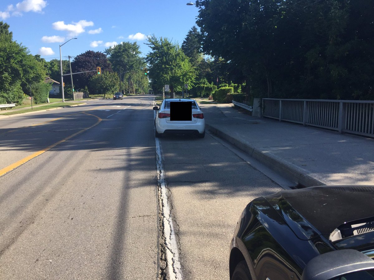 CstTaraso9345's tweet image. G2 Driver going 79km/h in a 50km/h zone infront of @TABTigerLife school  on Rebecca #Oakville. Driver not wearing a seatbelt, no muffler and obstructed windshield. Driver charged accordingly. #ProjectSafeStart