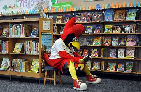 SLCL's tweet image. Join us tomorrow at 10am at the new Mid-County Branch (7821 Maryland Ave in Clayton) for Fredbird Friday! @TeamFredbird will be there with ticket giveaways. Be sure and sign up for a new @Cardinals library card while you’re there! #NationalLibraryCardSignUpMonth