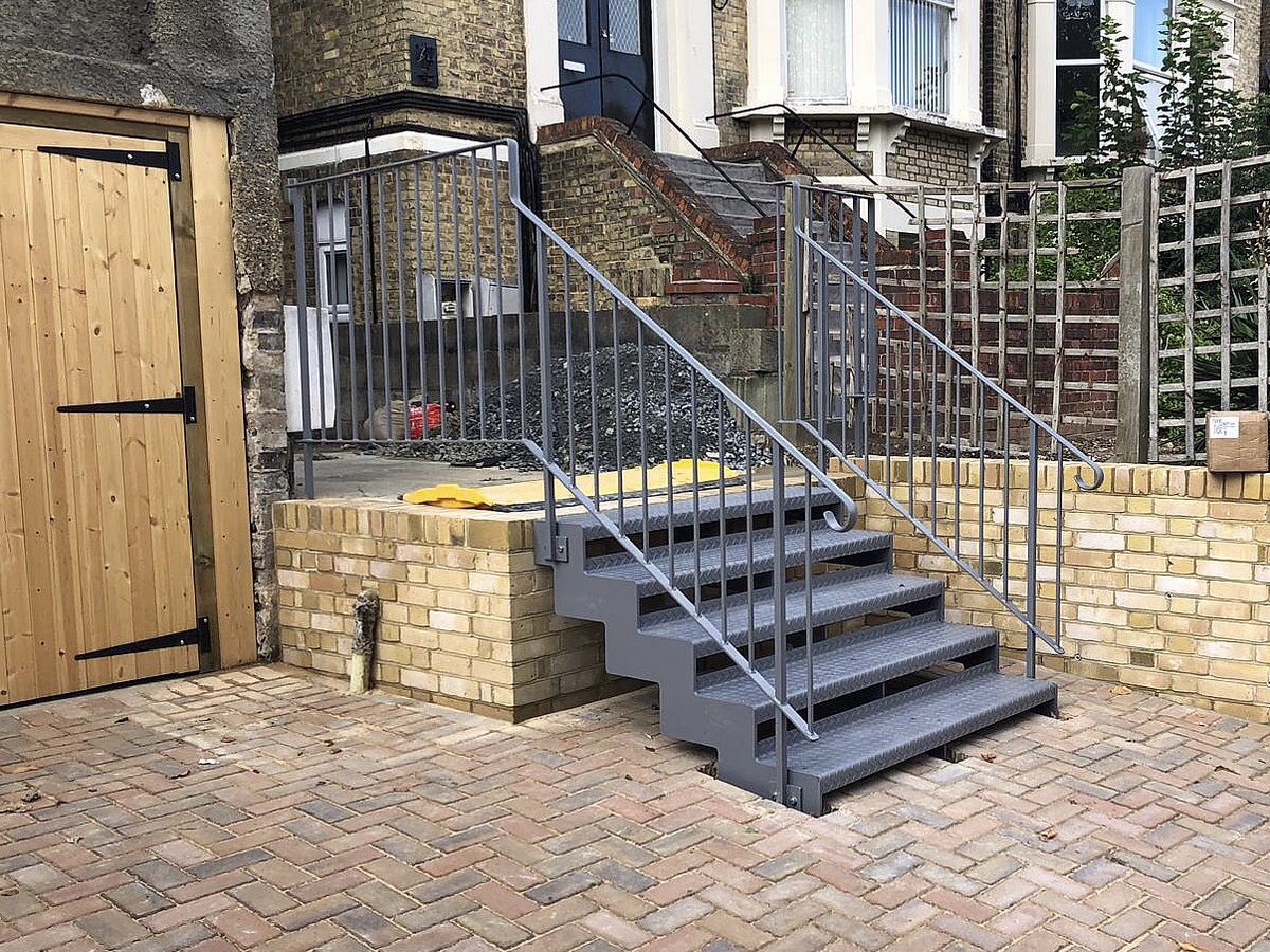 Metal staircase and hand rails fitted in Penge to allow side access to property following a driveway installation #staircaseinstallation #staircase #installation #contractor #london