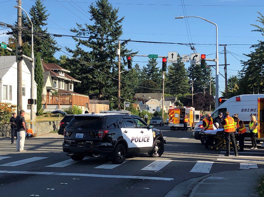 joshfarley's tweet photo. A mother and three children were struck in a crosswalk at 11th/Naval in Bremerton just minutes ago. All were conscious and en route to hospital, @BremertonPD tells me. Only the second day of school -- watch those crosswalks carefully. https://t.co/jcjASVgCUJ