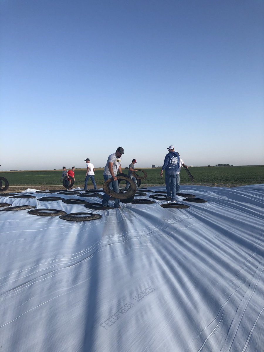 scc_ag's tweet photo. Ag Club Students and instructors are helping to cover a silage pile at a local dairy. This is an opportunity to see a variety of different skills in covering a silage pile. @scc_ag @SCCNeb #classroomsareoutside https://t.co/EIg17lnkhX
