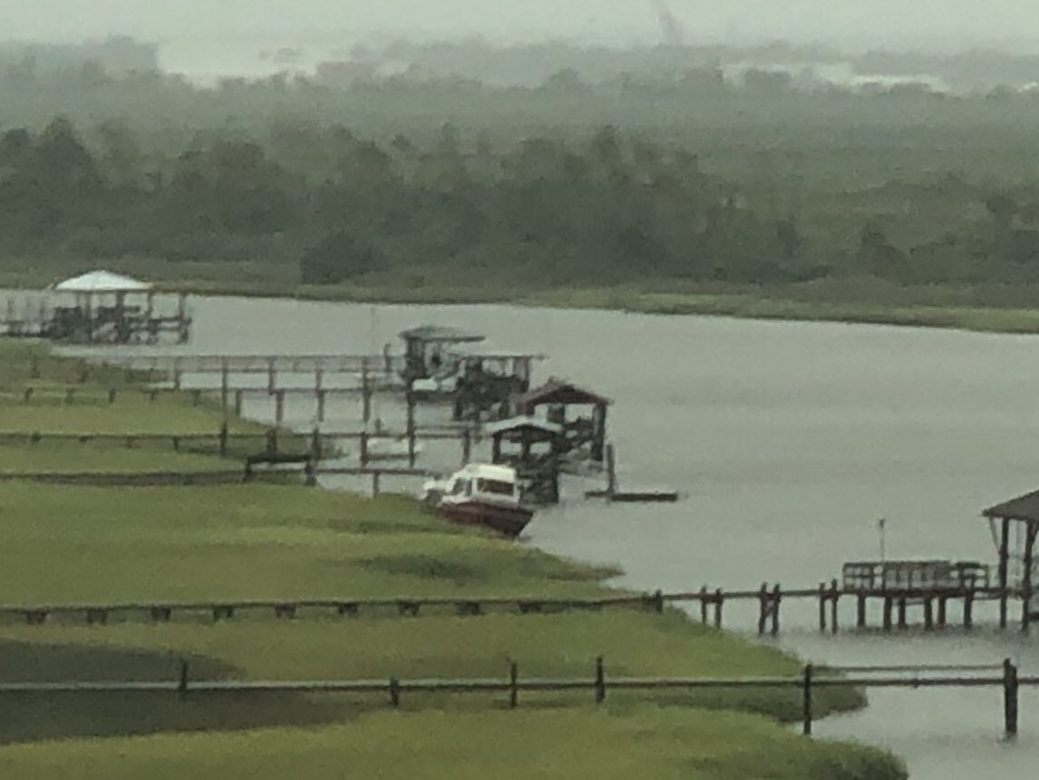 ChristineGtv's tweet image. Boat in the marsh and off its moorings on Clouter Creek. View from 526 EB. #ImNotDriving #hurricandorian #CHSwx
