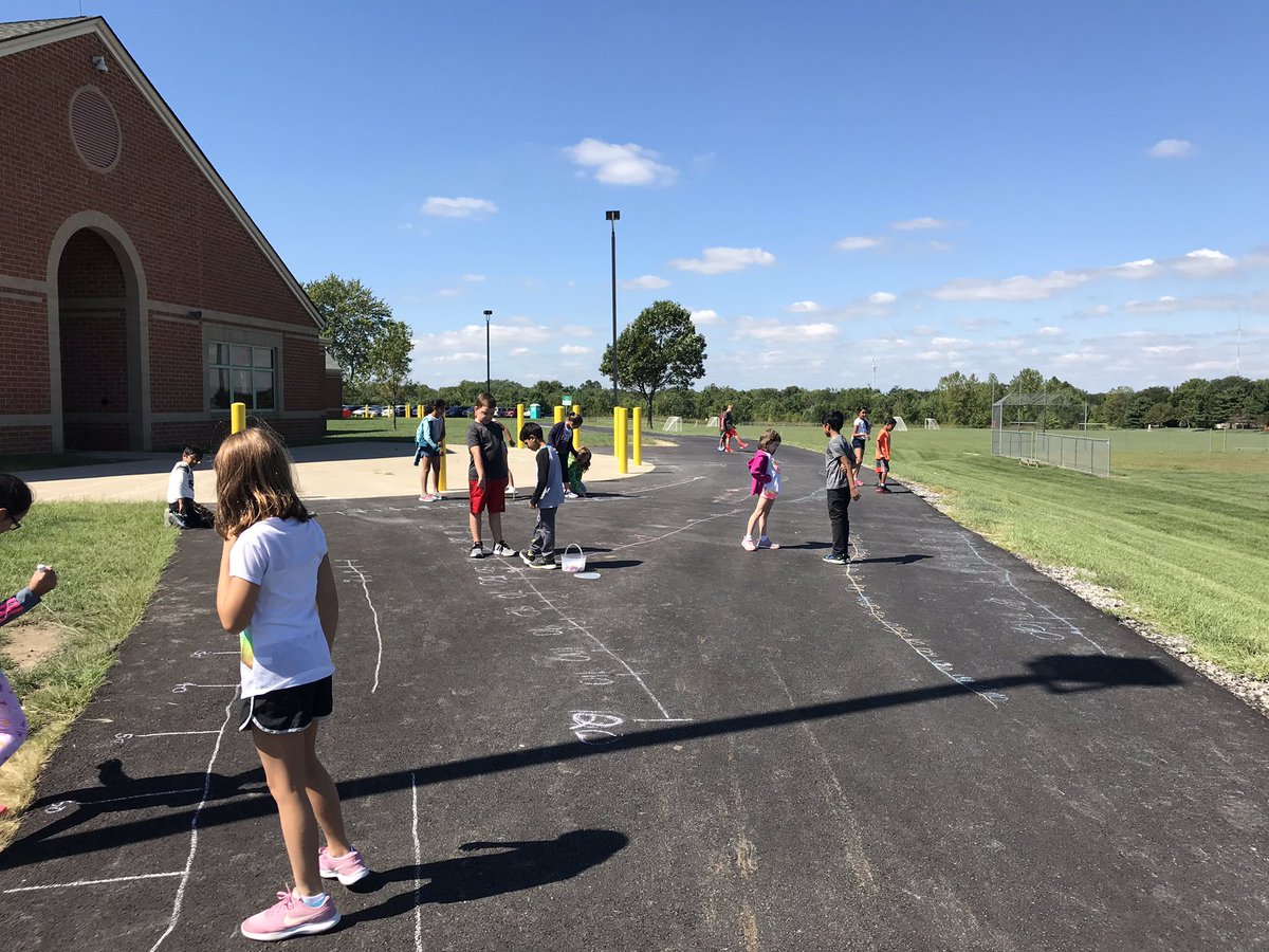 Learning how to round whole numbers using sidewalk chalk number lines—So much fun on such a beautiful day! #masonshines #masonmoment