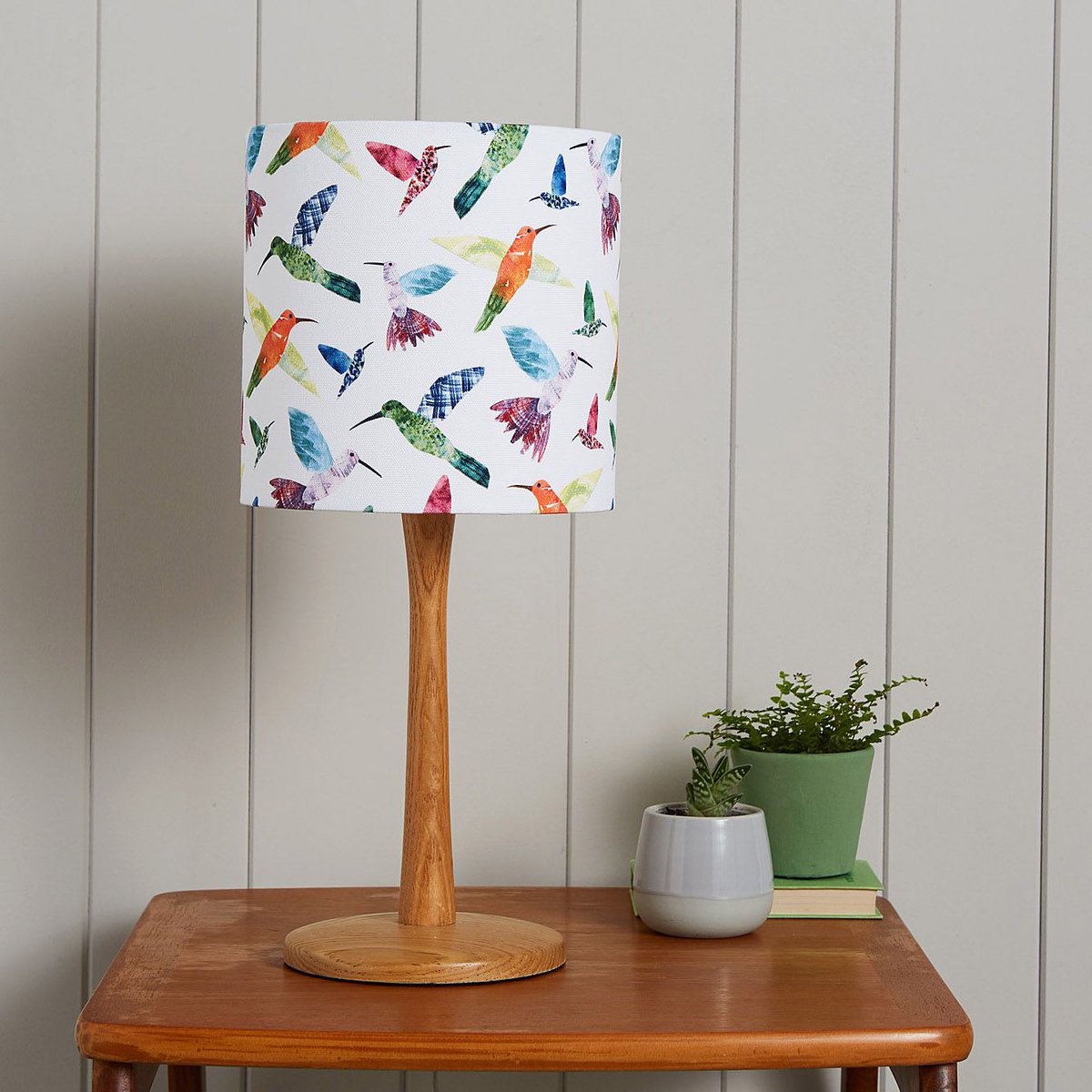 Two of this month's new lampshades. Super colourful hummingbirds and rather more monochrome feathers. rosaandclaradesigns.co.uk/lampshades