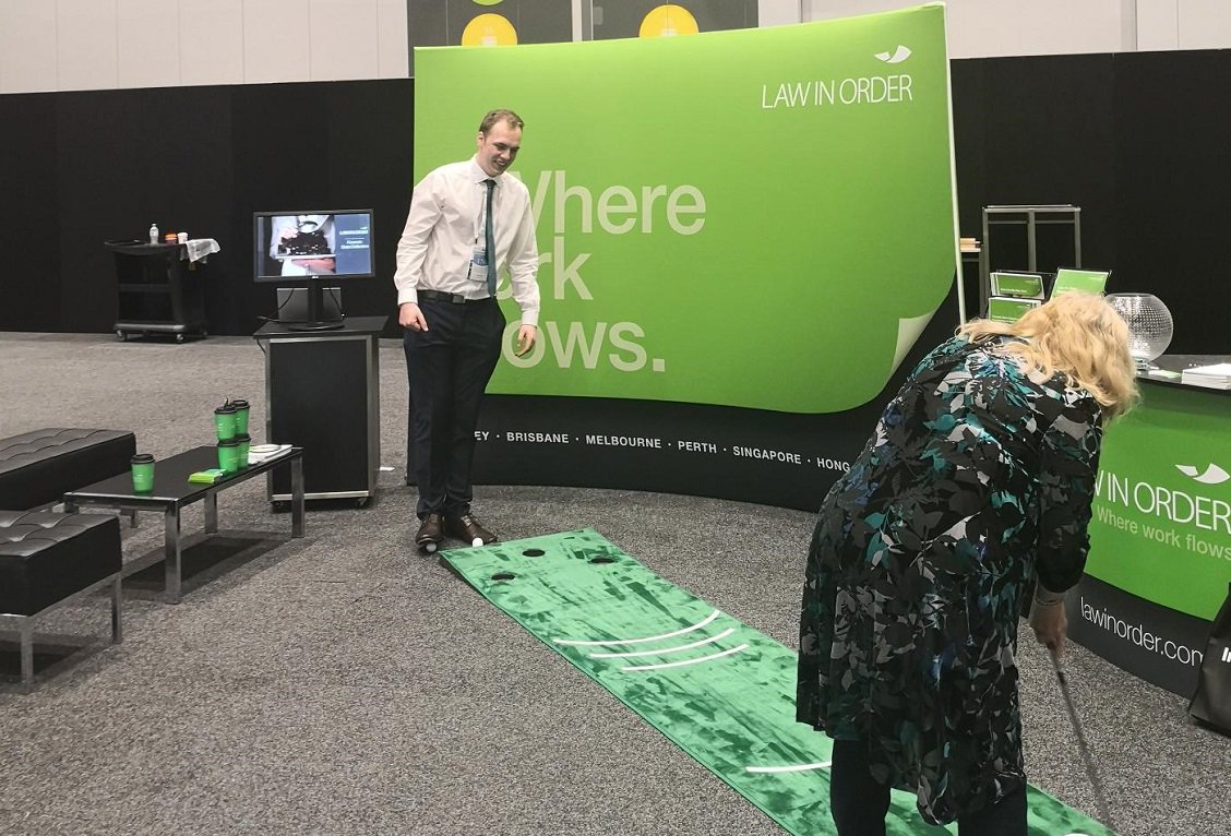 Law_In_Order's tweet photo. A great way to kick off Friday at ALPMA, come and try your skill at our putt-putt to win some great prizes! Also make sure you enter our business card draw at our stand for your chance to win a $200 voucher to Lucy Liu’s restaurant. #ALPMASummit https://t.co/ZBn2i4qNkP