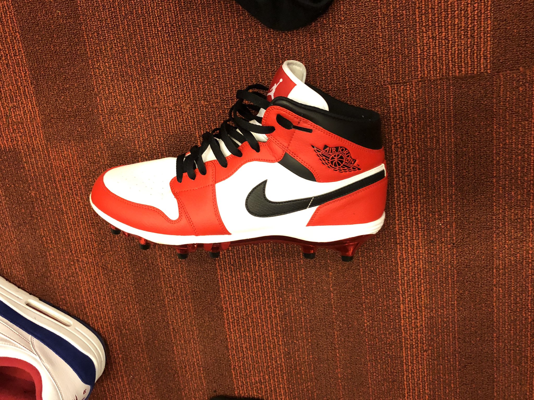 Orange jordan cleats cheap