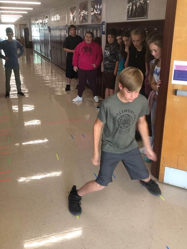Curtis_PHS's tweet photo. When you and your colleague in special ed combine your powers and some gaffers tape you get this!  I am proud to present the first segment of the PHS "movement maze"! #VTEd #GRCSU #TeacherLife #ILoveMyJob #MiddleSchool https://t.co/o7gvmSDNLt