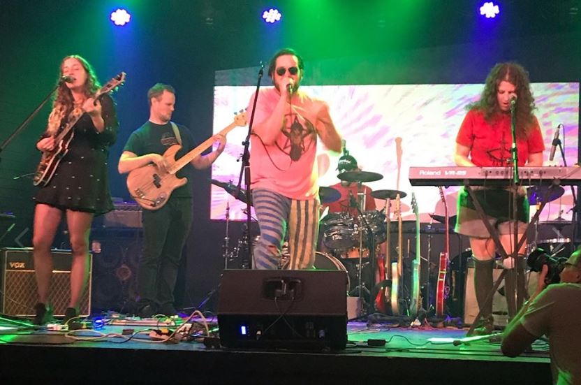 <a href="/BadHooBand/">BAD HOO</a> A miscommunication on our part! Shout out to <a href="/ThePlodes/">The Plodes</a> who rocked the Square in their place yesterday. 👏